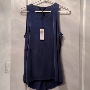 BCBG maxazria NWT blue top, slit back